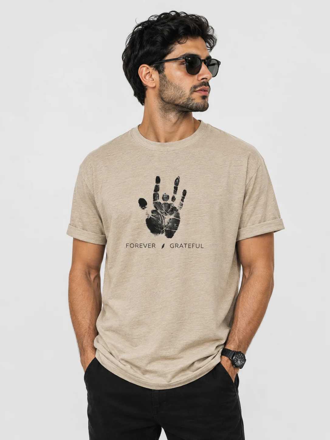 Man wearing a graphic t-shirt with a handprint design